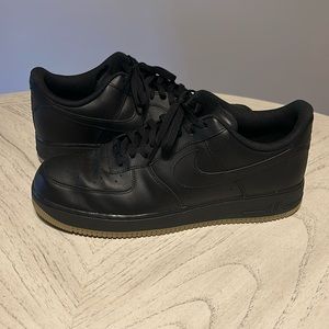Nike Air Force 1. Black with Gum bottoms.